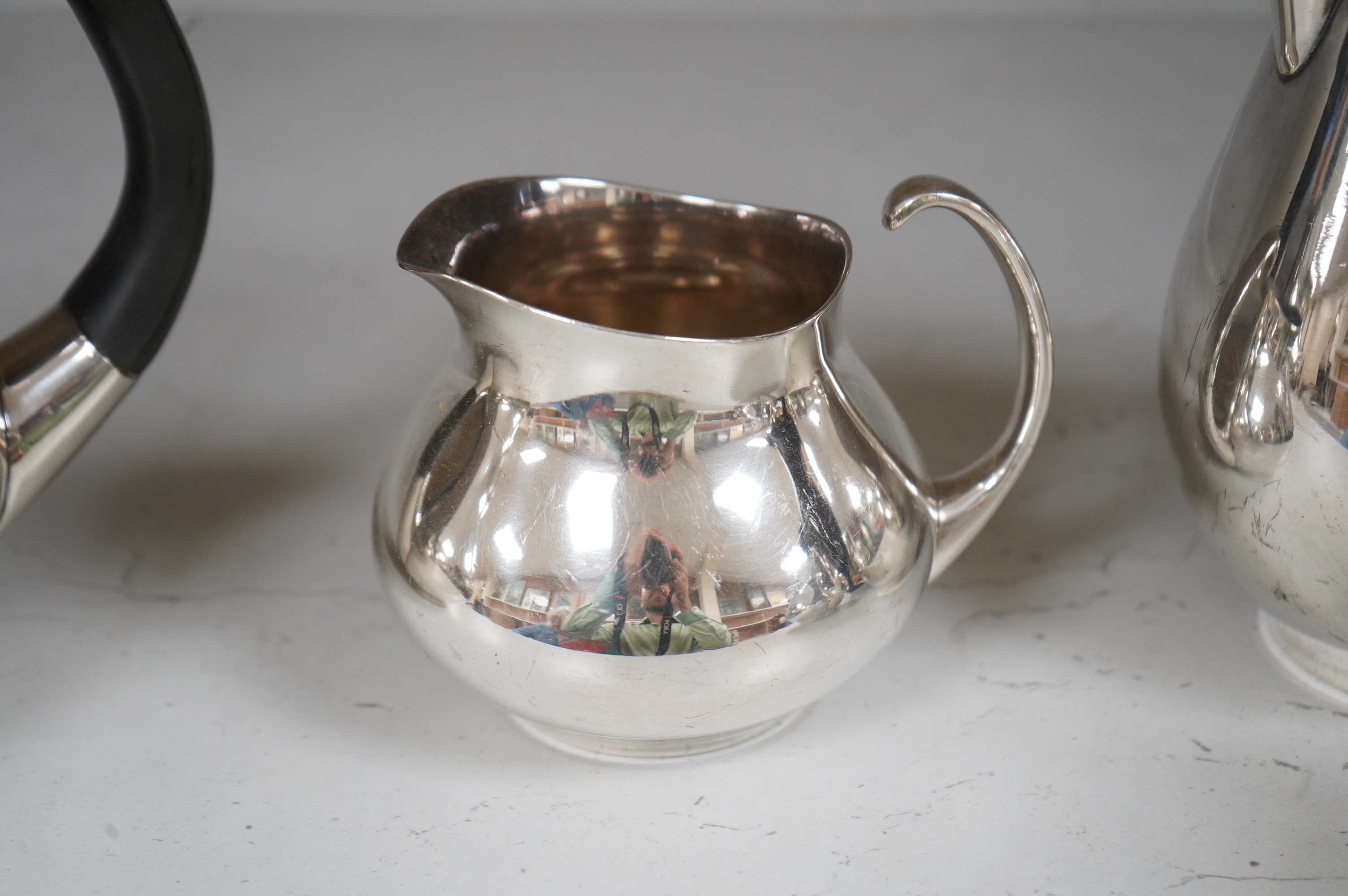 Eric Clements (1925-2019) a four piece plated tea set, c.1960, Embassy plate by M&W England, water jug and cover, 19.5cm high